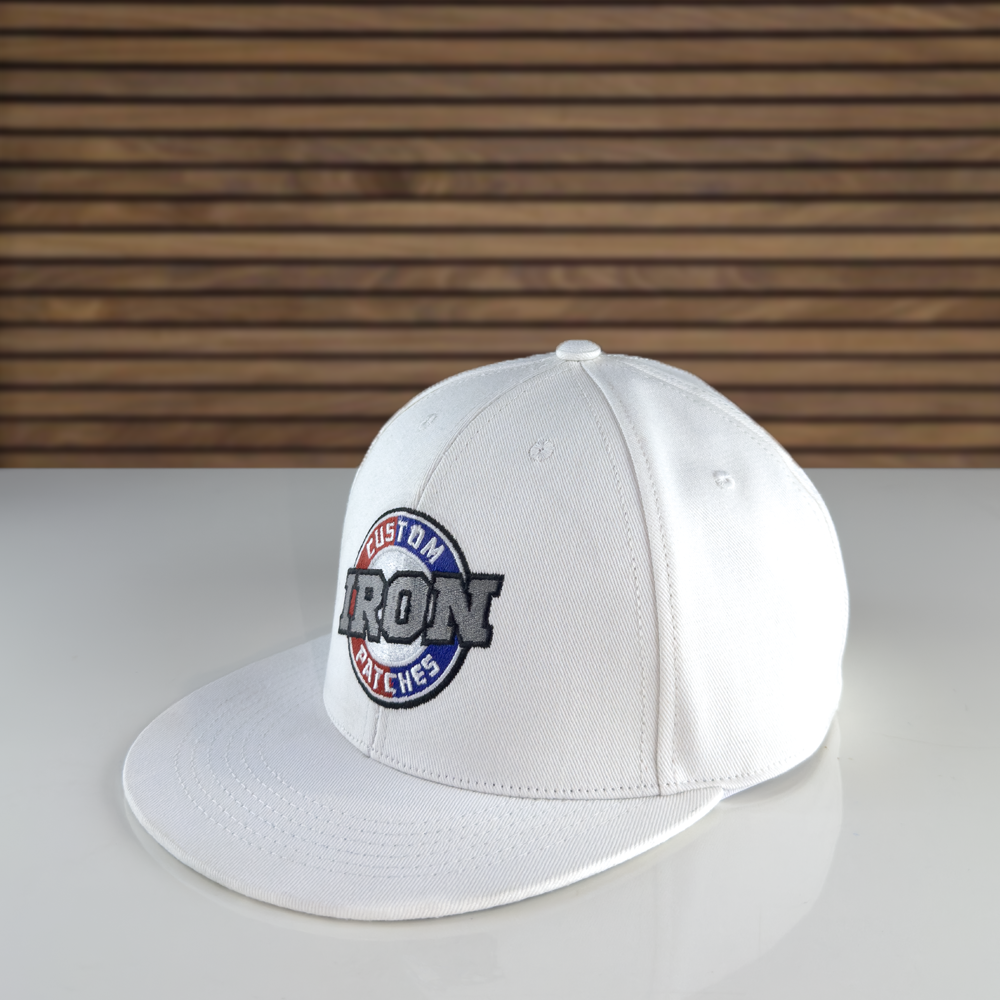 Custom White Trucker Hat with Embroidered Iron Patch for Branding.
