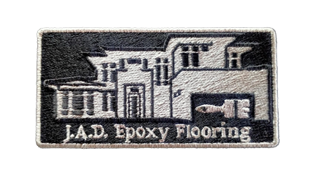 Rectangle-shaped custom patch with embroidered details for branding.