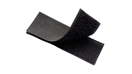 Flexible Velcro backing for patches, ensuring easy attachment and removal.